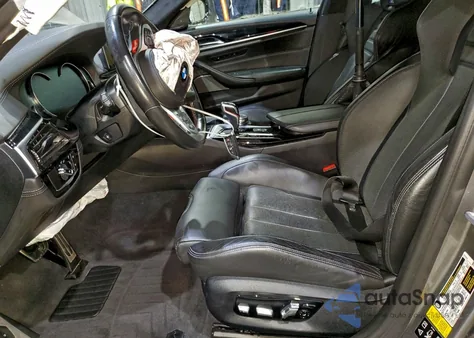 2018 BMW M5 z USA, uszkodzony, nr VIN WBSJF0C54JB283060